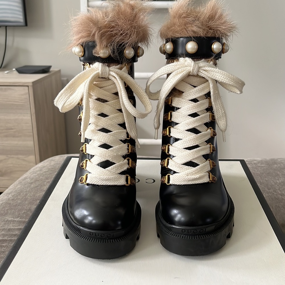 Gucci Leather Combat Boots with Fur Trim and pearl strap.